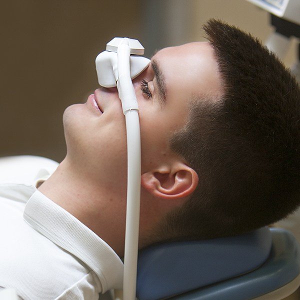 Patient relaxed thanks to nitrous oxide sedation dentistry treatment